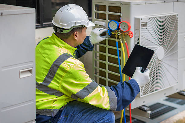 Professional Hvac technician working in Wellesley Hills, MA